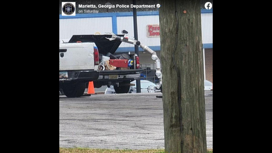 The man told police he believed there was an explosive device in the back of a truck parked outside the shopping center.