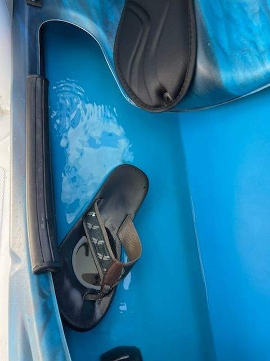 The pair of shoes found on the kayak shared by the U.S. Coast Guard on Facebook