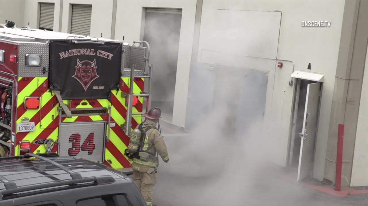National City, California, firefighters at the scene of a crematorium accident Thursday that sent human ashes into the air.
