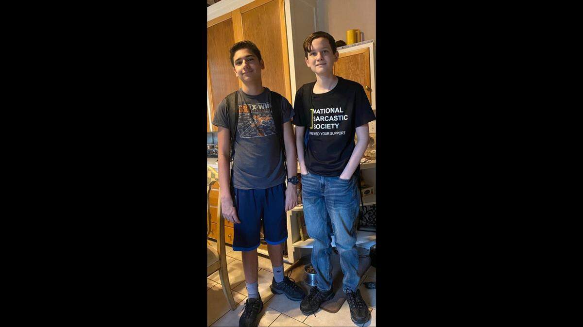 After 15-year-old Rocky Delfs, left, collapsed from cardiac arrest related to Brugada syndrome, a Kansas family learned his twin brother Alias, right, also had the syndrome. Photo from Bill Delfs.