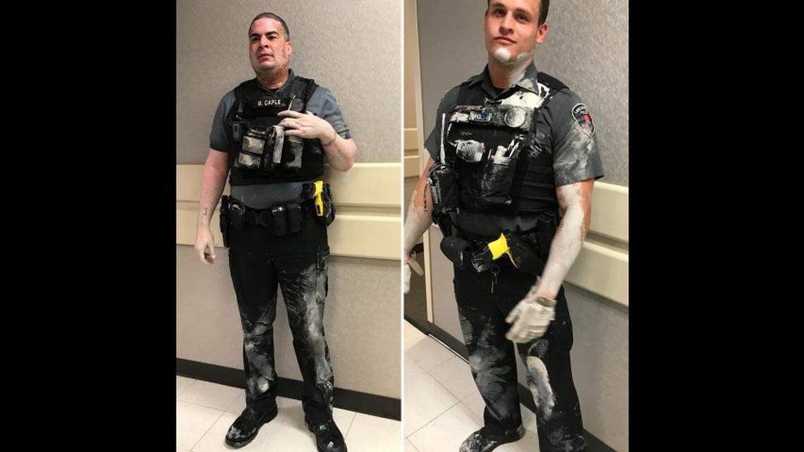Photos show how paint rubbed off the suspect and onto police as they tried to handcuff him Monday morning.