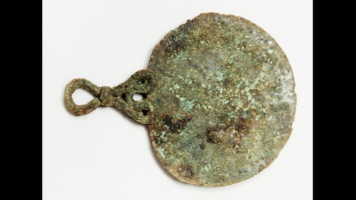 A wooden and/or hide shield was among the burial goods found in the Iron Age grave.