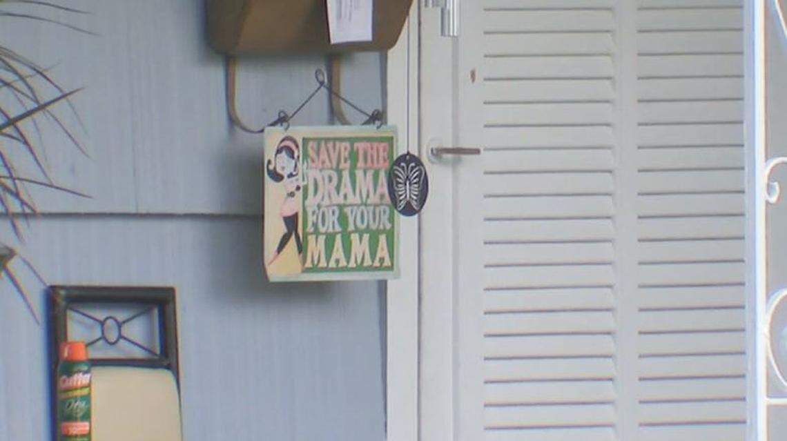 The sign outside the door that separated the woman from the naked intruder reads, “Save the drama for your mama.”