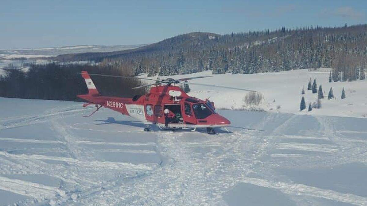 A snowmobiler was rescued by his friends after getting caught in an avalanche in Utah.