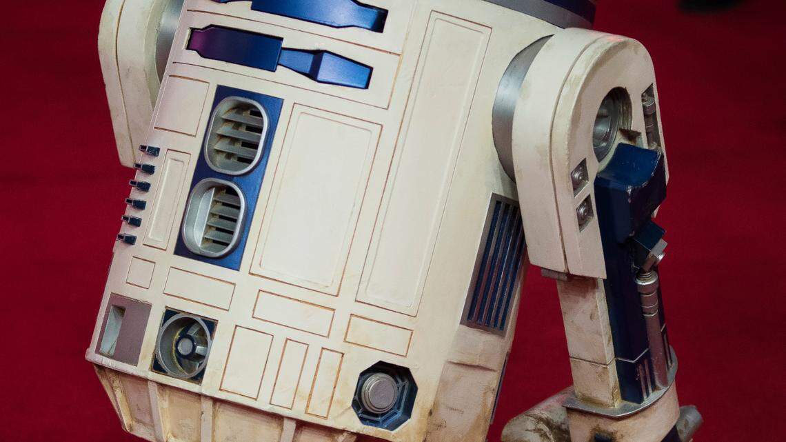 R2-D2 poses for photographers upon arrival at the premiere of the film ‘Star Wars: The Last Jedi’ in London, Tuesday, Dec. 12th, 2017. (Photo by Vianney Le Caer/Invision/AP)