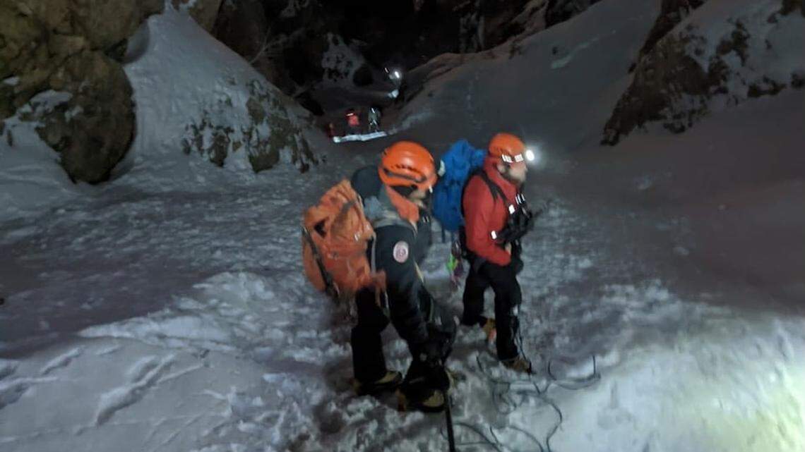 Two skiers were stranded on a freezing slope of Mount Olympus in Utah, rescuers said.