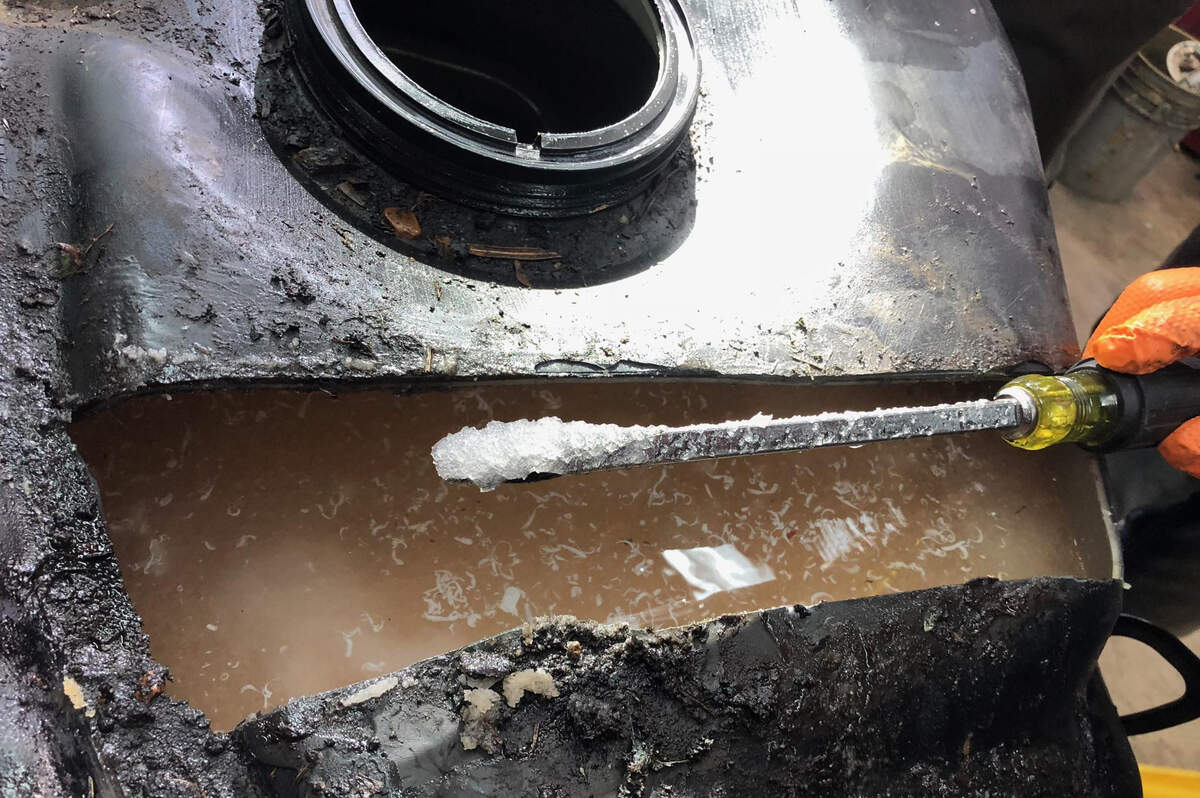 Jefferson County sheriff's deputies show some of the suspected methamphetamine that had already crystallized inside the gas tank.