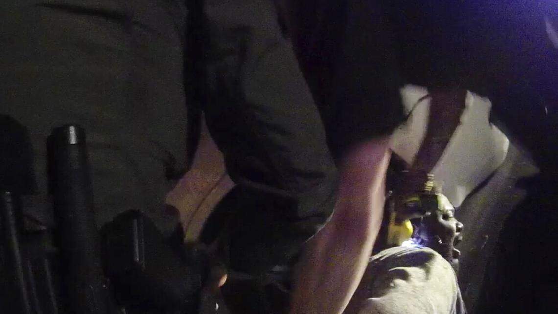 In this image made from a March 28, 2019, body-worn camera video provided by the Austin Police Department in Texas, Williamson County deputies hold down Javier Ambler as one of them uses a Taser on Ambler’s back during his arrest in Austin, Texas. The Black man died in custody in 2019 after sheriff’s deputies repeatedly used stun guns on him, despite his pleas that he was sick and couldn’t breathe, according a report published Monday, June 8, 2020, by the Austin American-Statesman and KVUE-TV. The video was made on the camera worn by an Austin police officer who also showed up at the scene as Williamson County deputies were making the arrest. (Austin Police Department via AP)