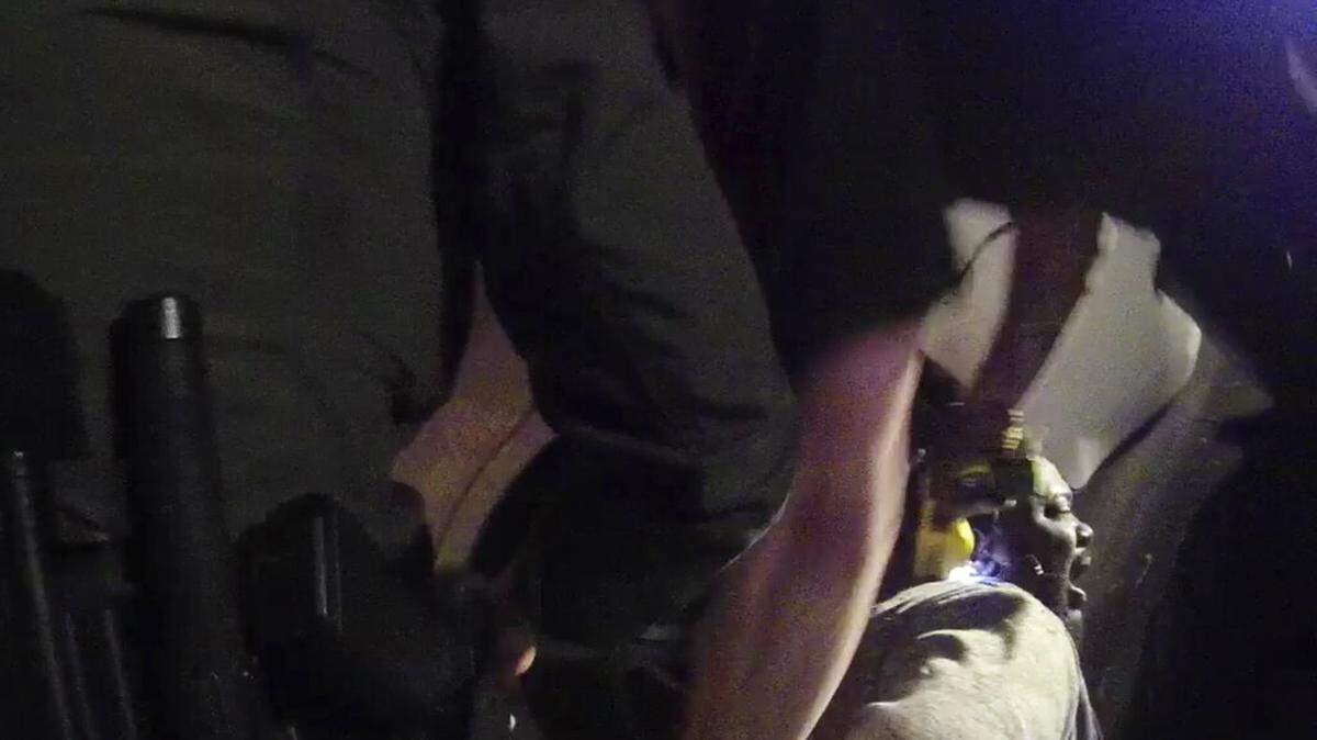 In this image made from a March 28, 2019, body-worn camera video provided by the Austin Police Department in Texas, Williamson County deputies hold down Javier Ambler as one of them uses a Taser on Ambler’s back during his arrest in Austin, Texas. The Black man died in custody in 2019 after sheriff’s deputies repeatedly used stun guns on him, despite his pleas that he was sick and couldn’t breathe, according a report published Monday, June 8, 2020, by the Austin American-Statesman and KVUE-TV. The video was made on the camera worn by an Austin police officer who also showed up at the scene as Williamson County deputies were making the arrest. (Austin Police Department via AP)