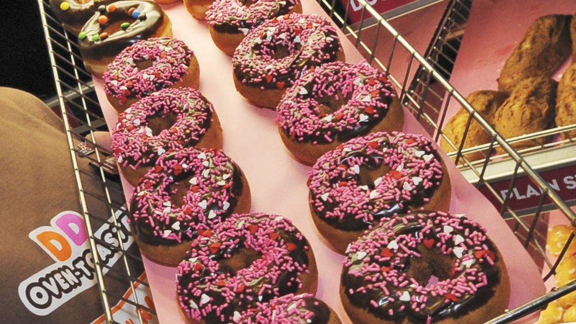 A woman was kicked out of a Dunkin’ for touching doughnuts on display (not the ones pictured) and pushing a supervisor, a Florida sheriff’s department said. (AP Photo/Lisa Poole, File)