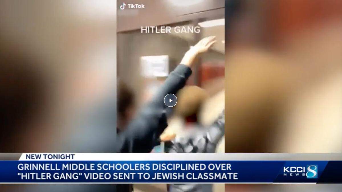 A family says a video on TikTok titled “Hitler Gang” with students goose-step walking through a Grinnell, Iowa, school was sent to their child, police say. Screengrab from KCCI.