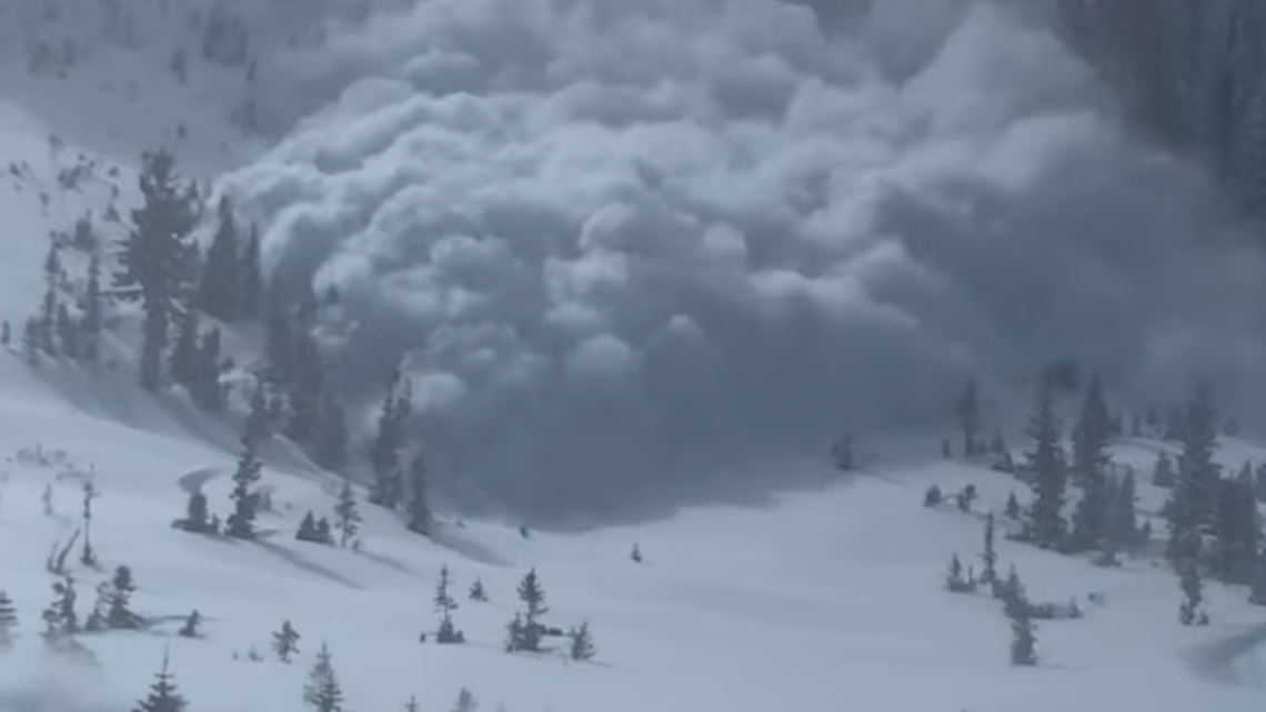 Brothers were snowmobiling in the Uinta Mountains when an avalanche buried them in snow, video shows.