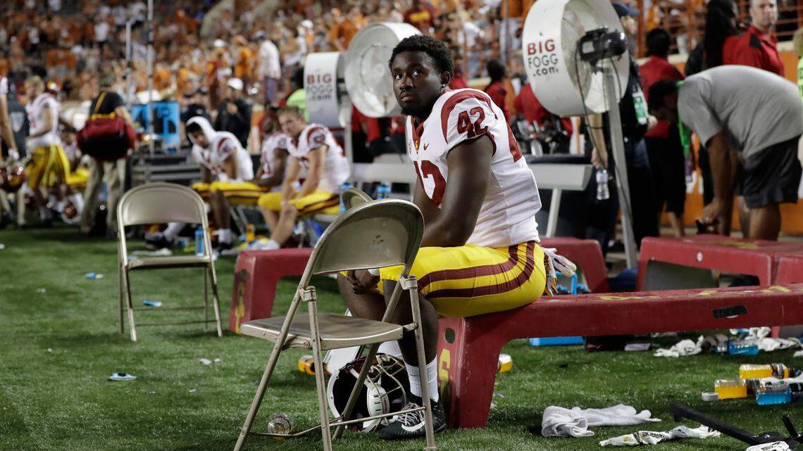 Former USC linebacker Abdul-Malik McClain sits on the bench during a 2018 game against Texas. McClain is accused of committing COVID-19 unemployment fraud while attending the university.