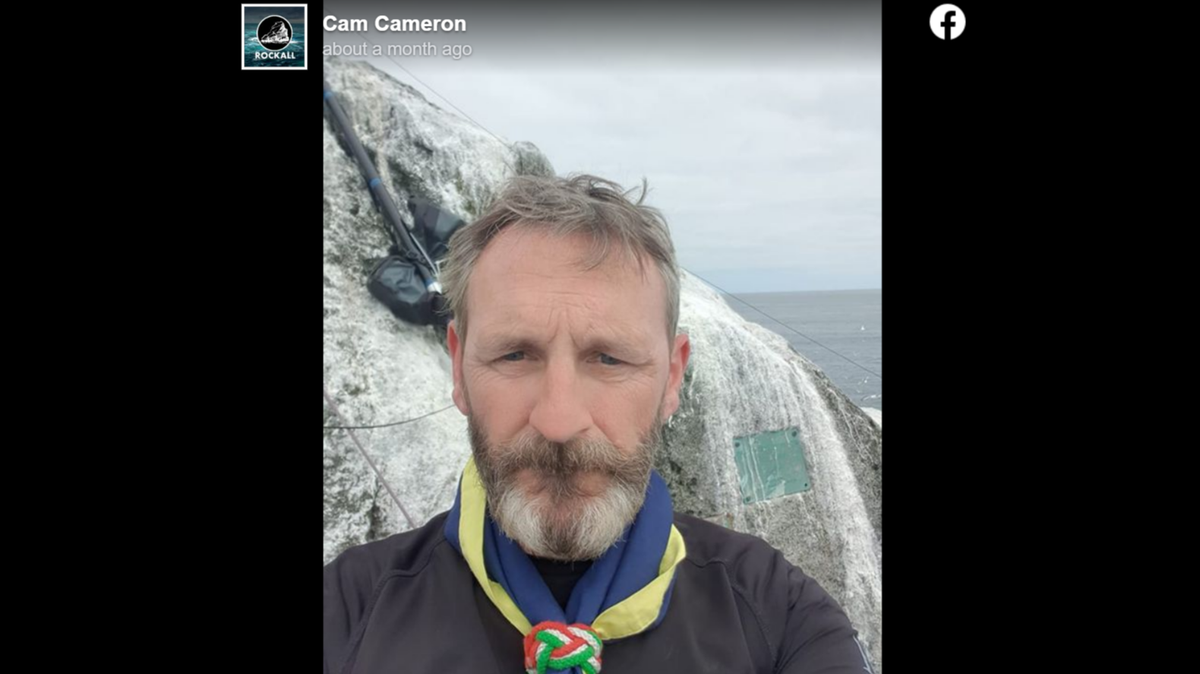 Christopher “Cam” Cameron was rescued from Rockall, a remote island off the coast of Scotland, while trying to break a world record, according to the Rockall Expedition, a charity.