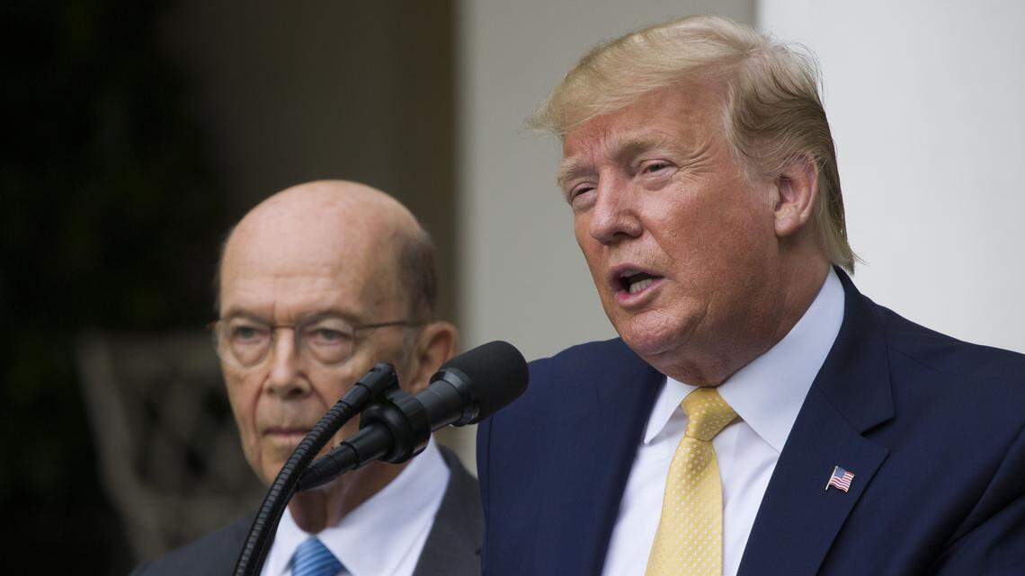 President Donald Trump, accompanied by Commerce Secretary Wilbur Ross, speaks about the 2020 census in the Rose Garden of the White House, Thursday, July 11, 2019, in Washington. (AP Photo/Alex Brandon)