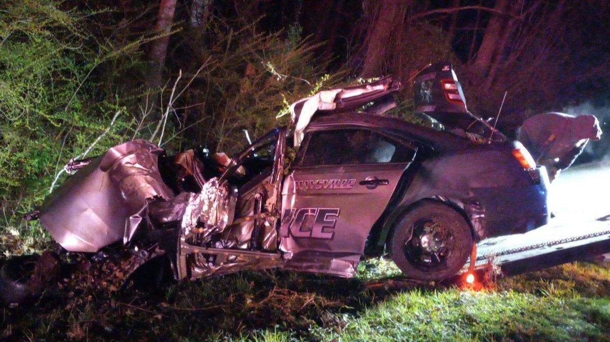 The front of a North Carolina officer’s cruiser was mangled after the crash.