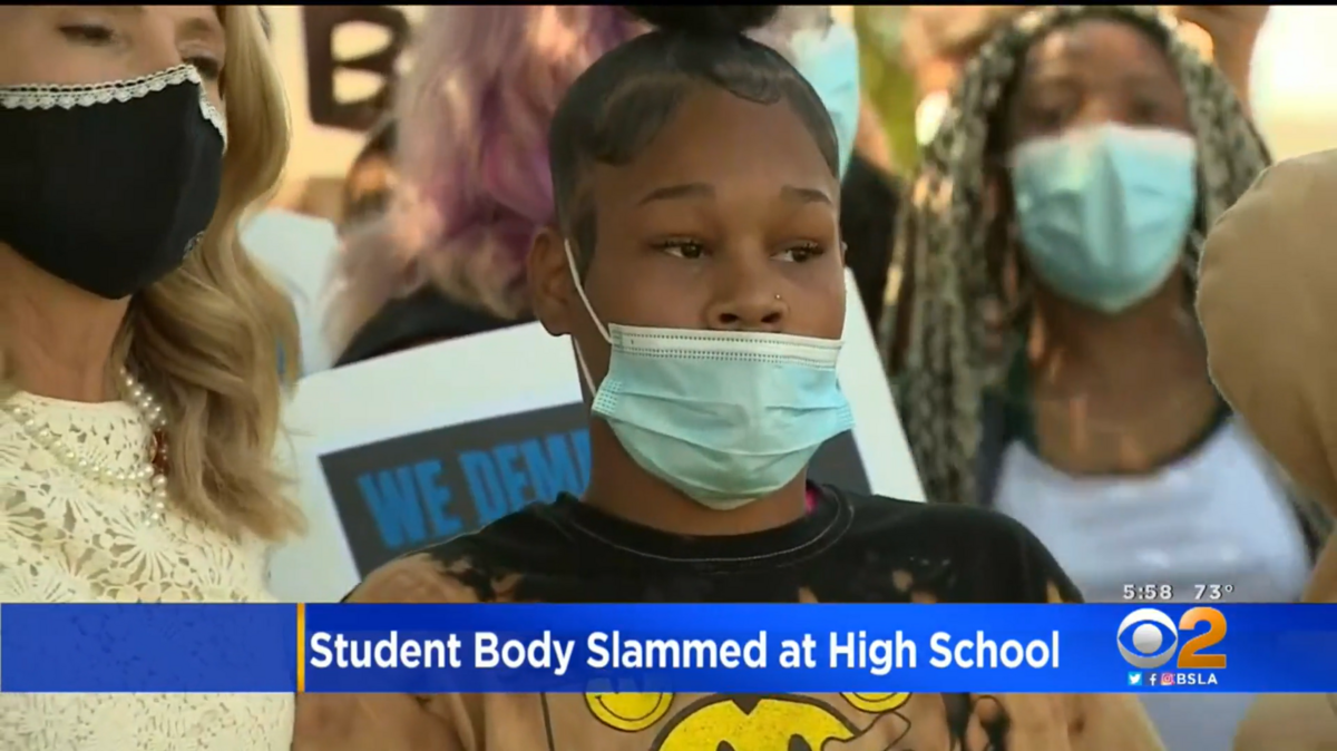 Mikaila Robinson, 16, was body-slammed by a school resource deputy at Lancaster High School, sparking outcry from the local community. Robinson is pictured here at a protest outside of the school on Wednesday, Sept. 15.