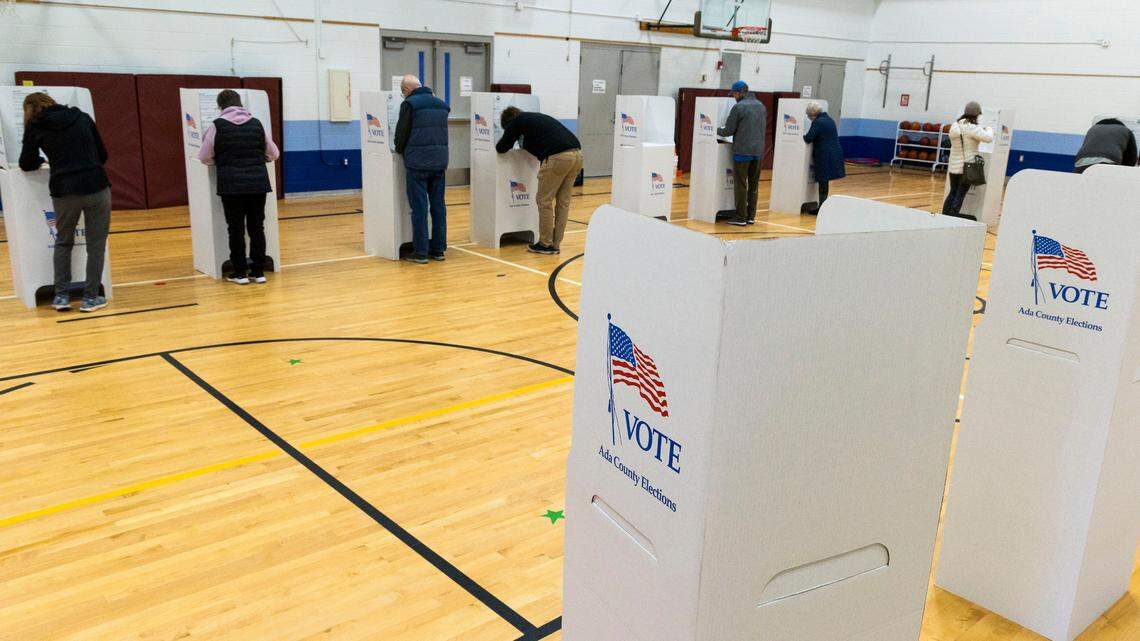 A steady turnout of voters cast their ballots at Shadow Hills Elementary School in Boise, Idaho, on Election Day, Tuesday, Nov. 8, 2022. The U.S. is on track to spend over $16.7 billion on the midterm elections, according to an OpenSecrets analysis. (Darin Oswald/Idaho Statesman via AP)