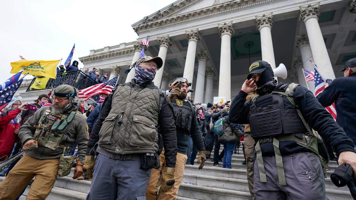 Members of the Oath Keepers on the East Front of the U.S. Capitol on Jan. 6, 2021, in Washington. (AP Photo/Manuel Balce Ceneta)