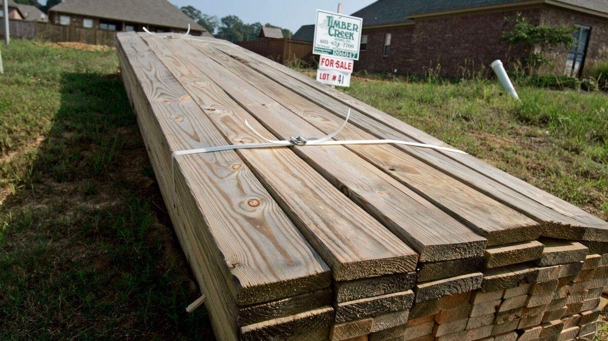 Lumber prices are going down, but the cost of a house is still high compared with pre-COVID-19 levels, experts say.