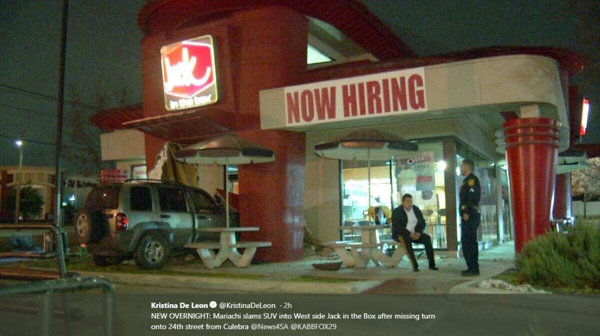 A Mariachi band member is detained after a crash involving an SUV and a Jack in the Box restaurant.