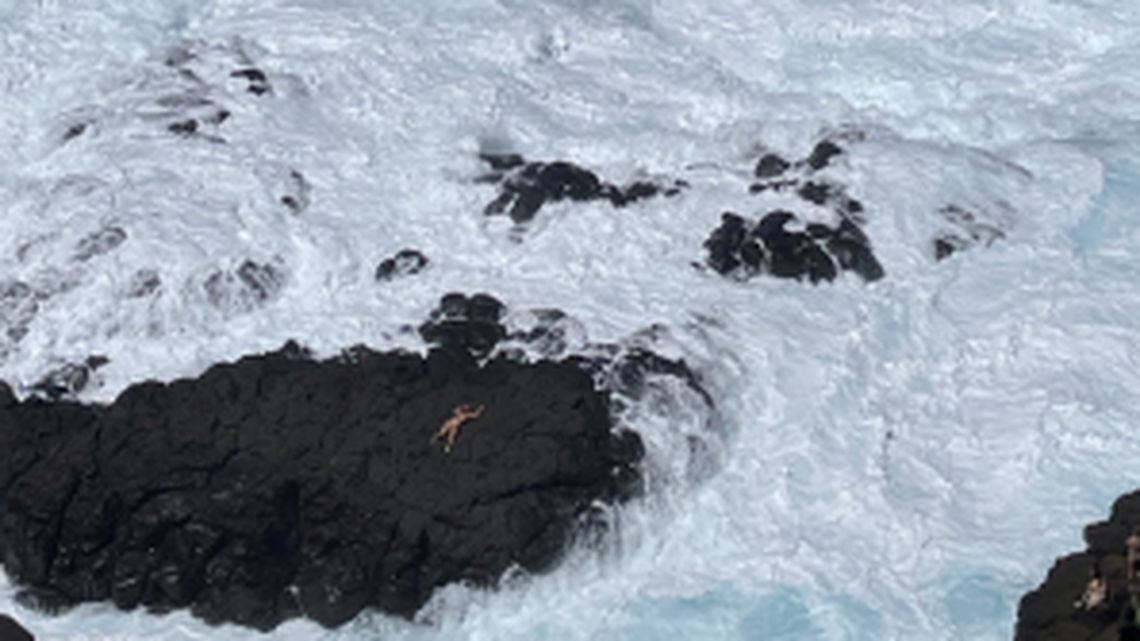 A father and son were swept out to sea in Queen’s Bath. This photo is from a rescue in March.