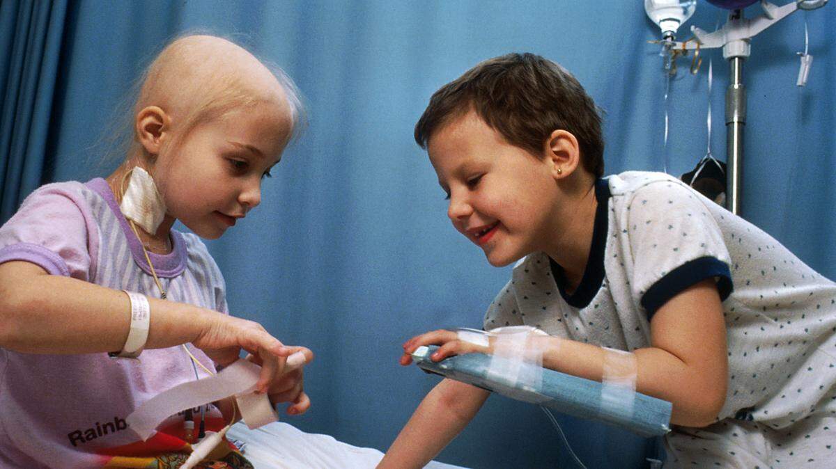 Two children with acute lymphocytic leukemia play in the hospital. A study published in the journal Nature Reviews Cancer found that children in "overly clean" houses are more likely to develop ALL, the most common type of cancer in kids.