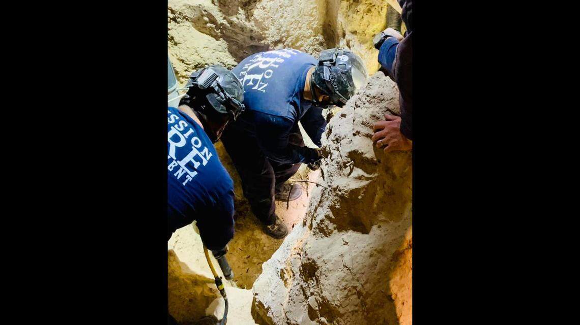 Firefighters chiseled into soil to free the boy from an 8-inch pit, officials say. Photo from City of Mission, TX - Government on Facebook.