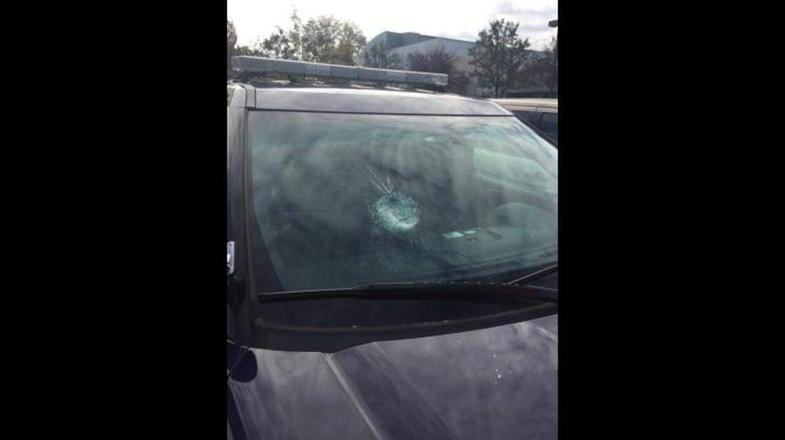 Police in Portland, Oregon, said an officer was inside one of the cars that was targeted.