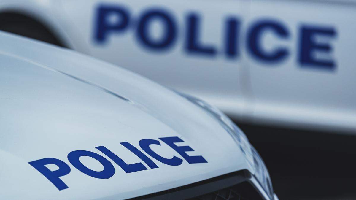 Two men were accused of chaining an unhoused man to a Jeep and dragging him, New Mexico police said.