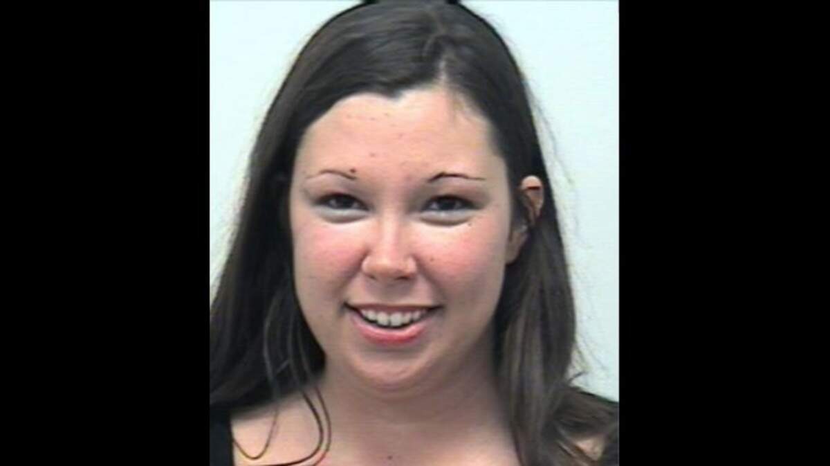 Adriane Grace Moss, 34, is charged with child endangerment in Lakeway, Texas, near Austin, where police say she passed out after locking herself and her 10-year-old son in a hot truck.