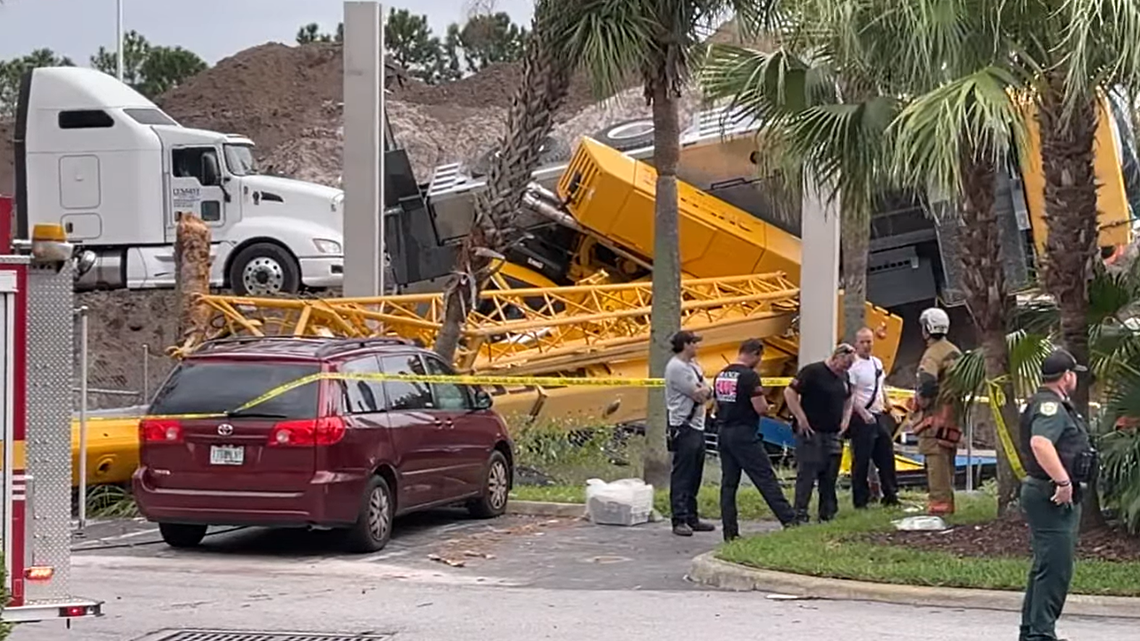 A construction worker was killed when a large crane toppled over in Orange County, Florida.