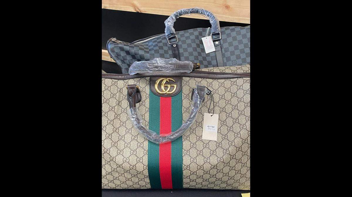 Federal authorities seized counterfeit Gucci and Louis Vuitton items and other merchandise at the First Monday Trade Days in Canton, Texas, officials say. Photo from Homeland Security Investigations Dallas.