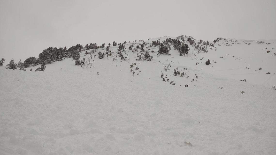 An avalanche killed two snowmobilers in Montana, officials said.