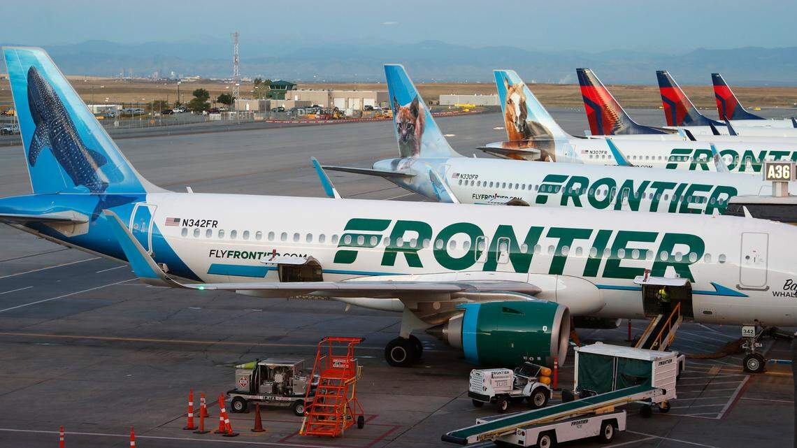Frontier Airlines planes sit at the gates at Denver International Airport in Denver in September 2019. Frontier Airlines settled a lawsuit filed by a North Carolina passenger after she said her seat was covered in vomit and a flight attendant reportedly refused to clean, court documents state.