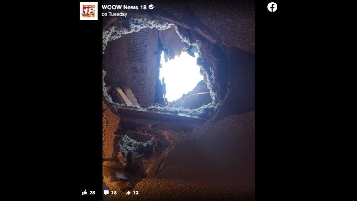 A 12-pound ice ball fell from the sky and blasted a hole in a Elk Mound, Wisconsin home nearly hit the homeowner. Screengrab from WQOW News 18 on Facebook.