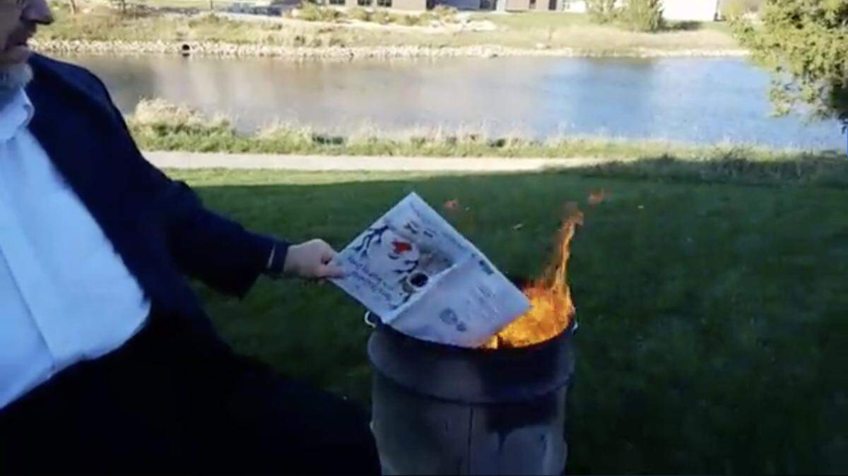 An anti-gay Iowa religious activist threw several LGBT children’s or young adult books from the Orange City library into a fire in a video posted on Facebook. The library is looking into legal options.