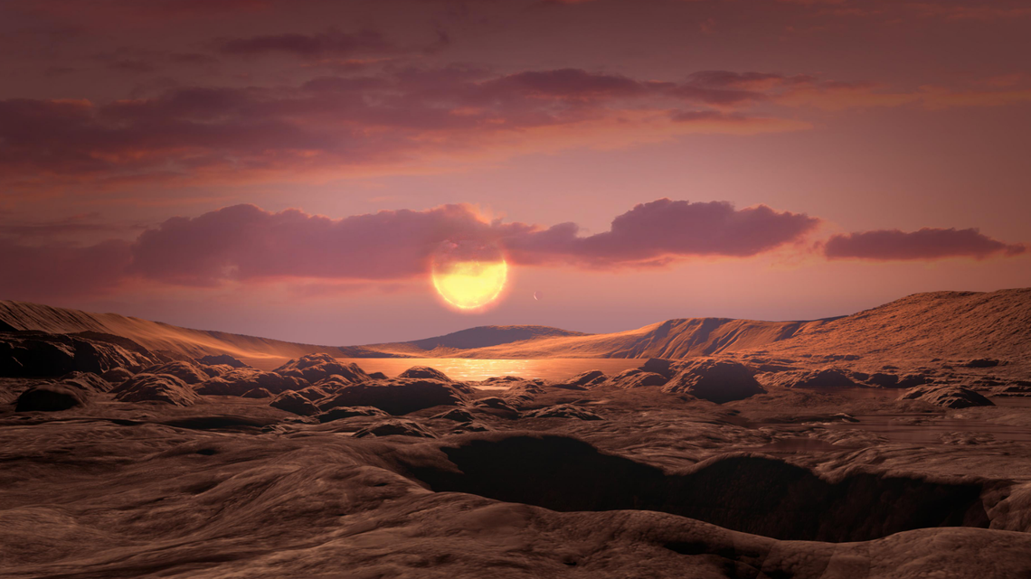 An Earth-like planet has been discovered 31 light-years away by astronomers. This artist’s concept shows what an exoplanet orbiting a red dwarf star might look like from the surface.