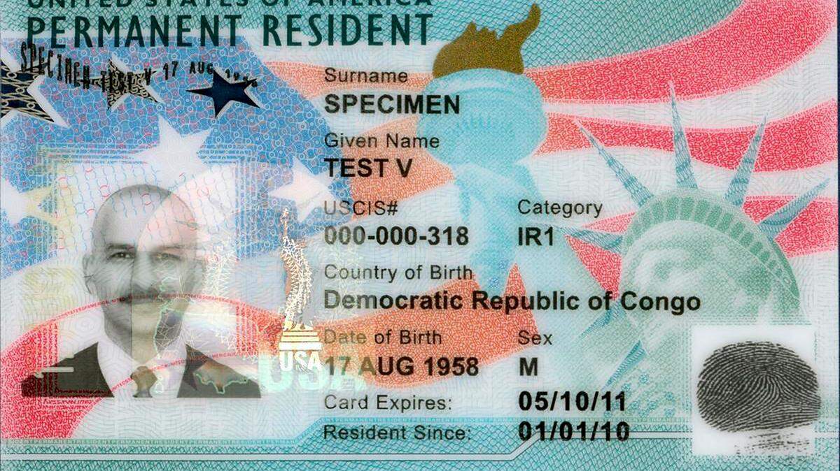This undated image from the U.S. Citizenship and Immigration Service shows the front of a sample “green card,” formally known as a Permanent Resident Card. (USCIS via AP)