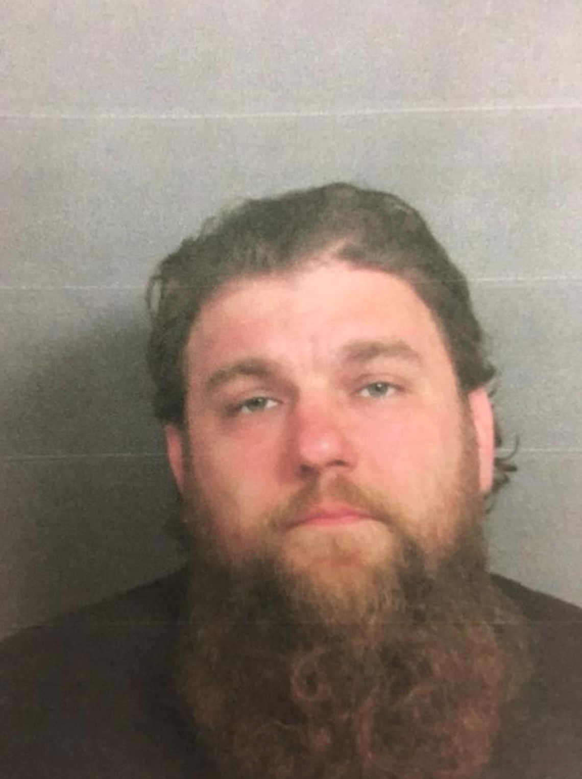 A mugshot of Michael Krajczynski, a Rhode Island man who police say overdosed on a suspected opioid with his son in the backseat.