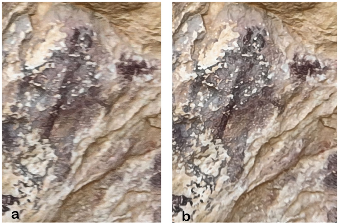 Painted human figures about four inches in size photographed on a cave wall