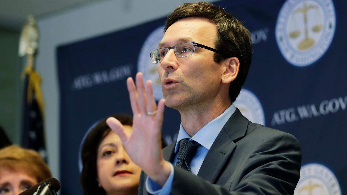 Washington Attorney General Bob Ferguson talks to reporters, Monday, Aug. 26, 2019, during a news conference in Seattle. Nineteen states, including Washington, are suing over the Trump administration’s effort to alter a federal agreement that limits how long immigrant children can be kept in detention. (AP Photo/Ted S. Warren)