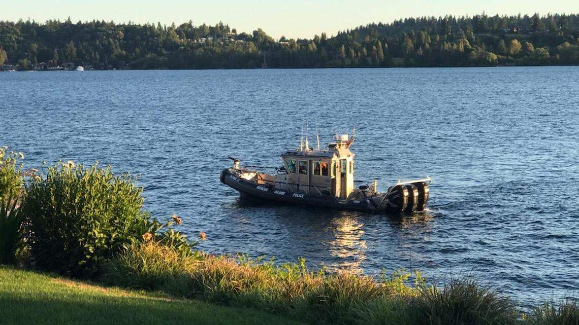 A man drowned trying to save a child who fell off a sailboat and into Lake Washington, the Bellevue Fire Department said.