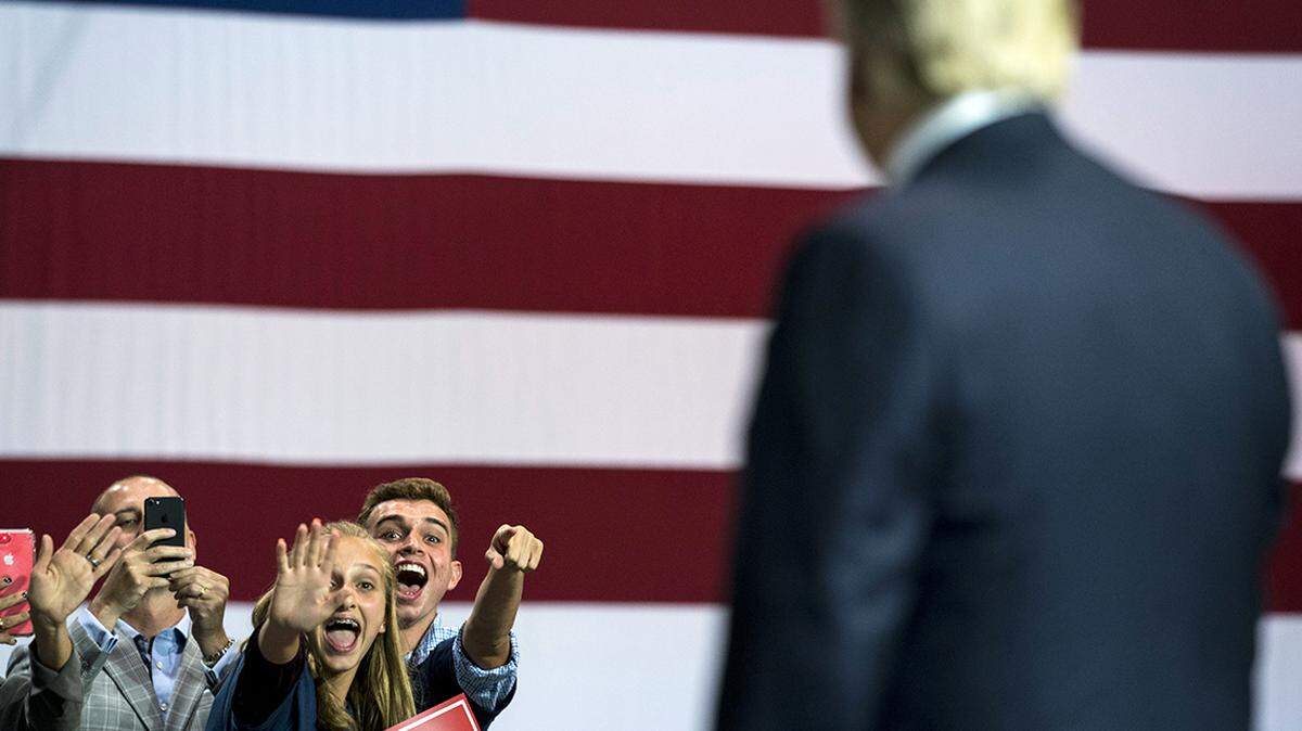 Supporters cheer President Donald Trump at a “Make America Great Again” rally at a fairground auditorium in Tampa, Fla., on July 31, 2018.
