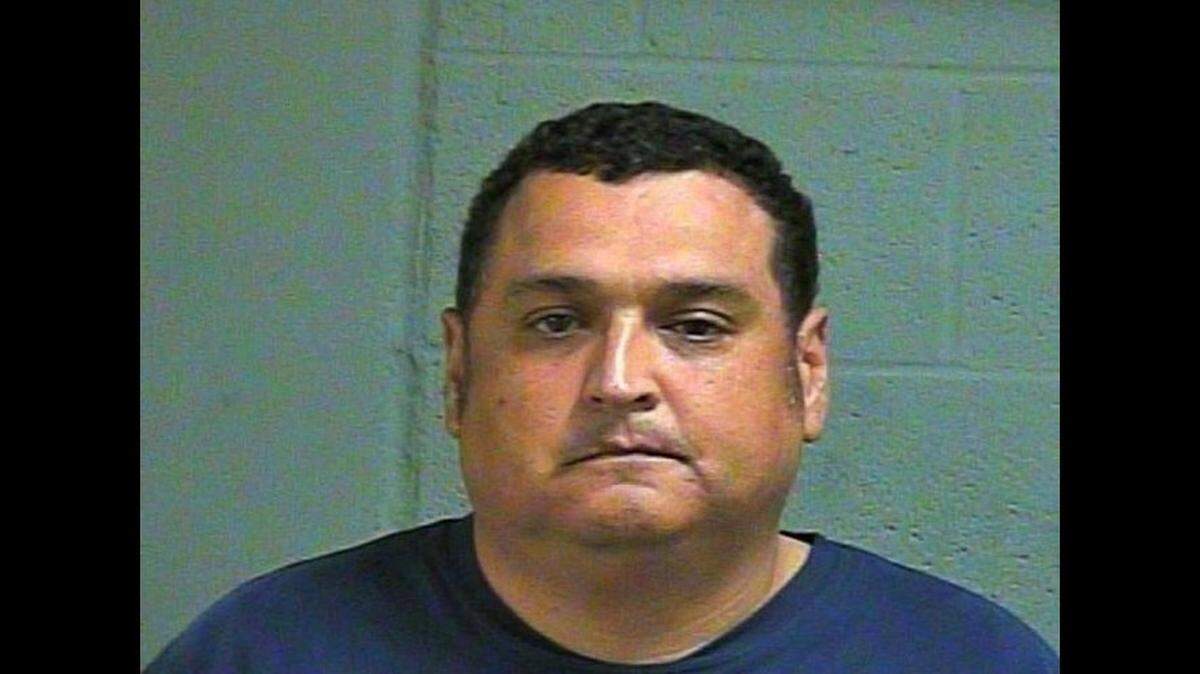 Michael Gene Edwards, 46, of Oklahoma City, was arrested late Monday night and charged with one count each of indecent or lewd acts with a child under 16 and unauthorized use of a computer network