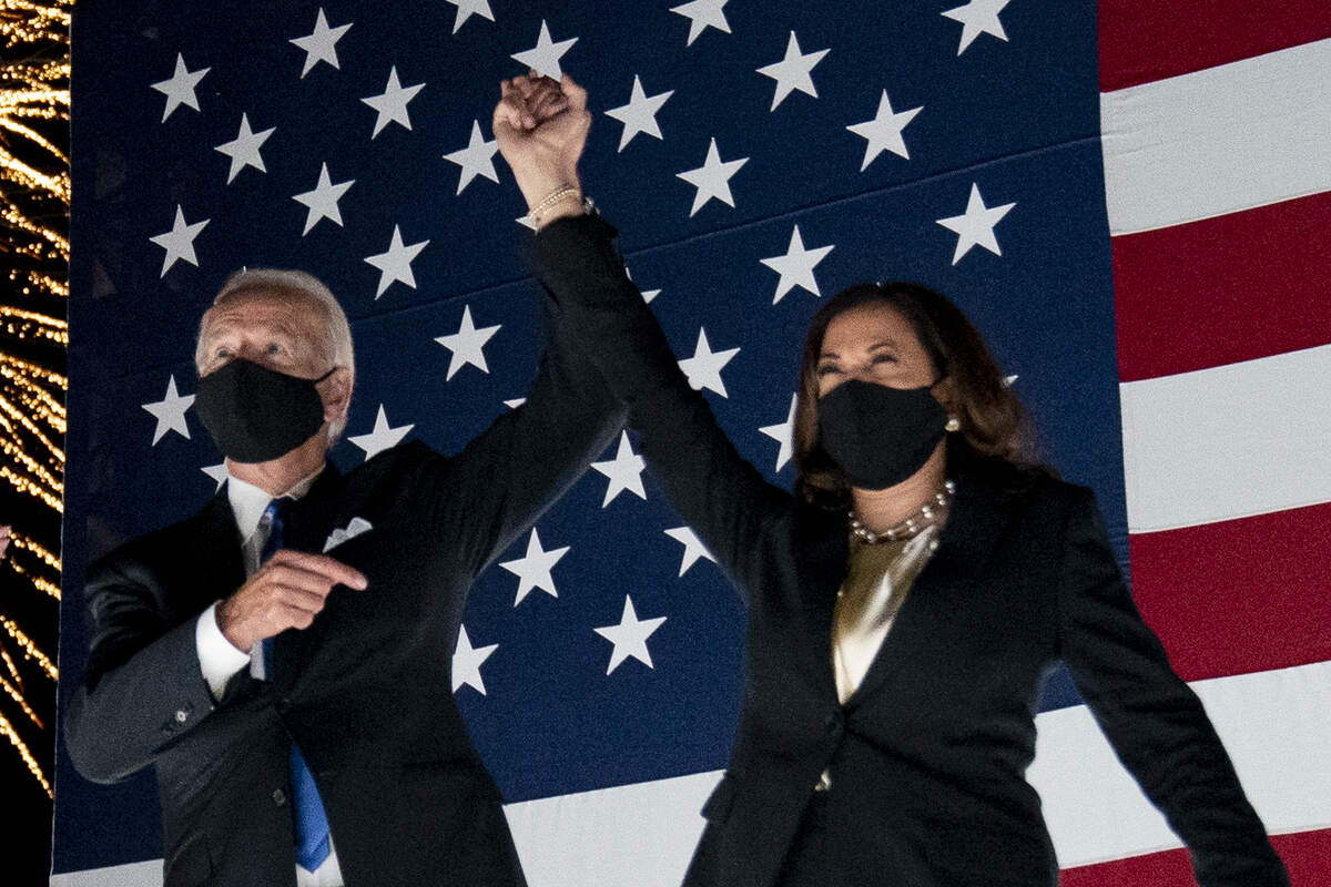 Democratic presidential candidate former Vice President Joe Biden and his running mate Sen. Kamala Harris, D-Calif., watch fireworks during the fourth day of the Democratic National Convention, Thursday, Aug. 20, 2020, at the Chase Center in Wilmington, Del. (AP Photo/Andrew Harnik)
