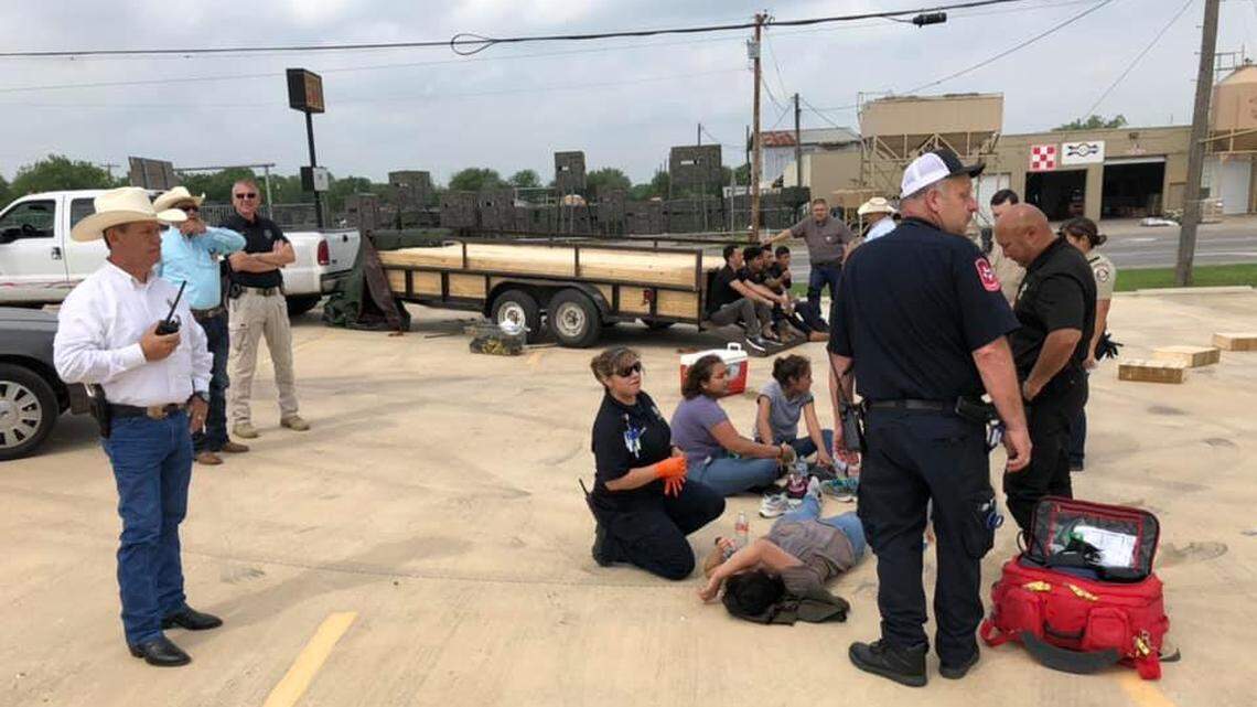 Atascosa County, Texas, deputies said a traffic stop near Poteet uncovered 16 people smuggled under a load of lumber construction materials behind a truck.
