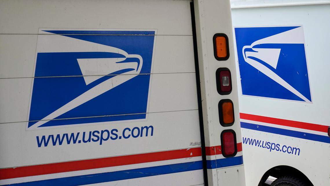 A USPS worker and a co-conspirator used access to the mail service to steal $250,000 and the identities of at least 50 people in Indiana, feds say.