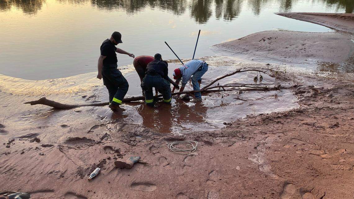 A 12-year-old boy fishing with his father at the Washita River in Oklahoma was trapped in quicksand and Tishomingo firefighters rescued him, officials say. Photo from Tishomingo Fire Department.