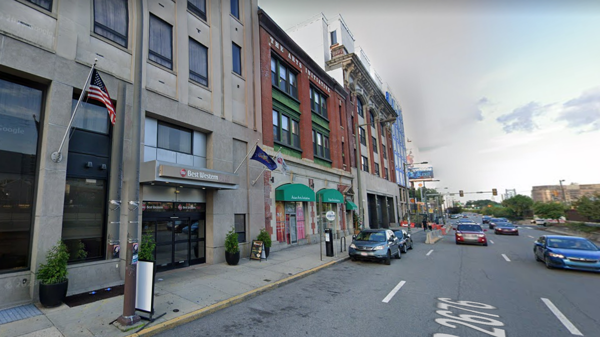A man accused of sexual assault was found bloody in a hotel lobby alongside a woman with a machete, police said.